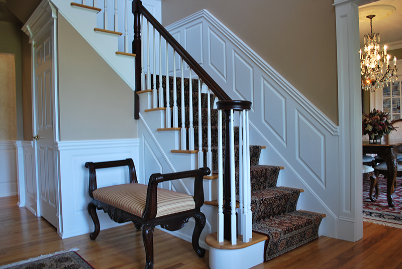 Beaded Raised Panel on staircase and in foyer. Notice how the staircase panel on the landing is about 34" and the back side of the landing panel is much taller.