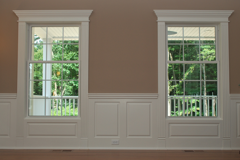 Window Trim integrated with Raised Panel Wainscoting